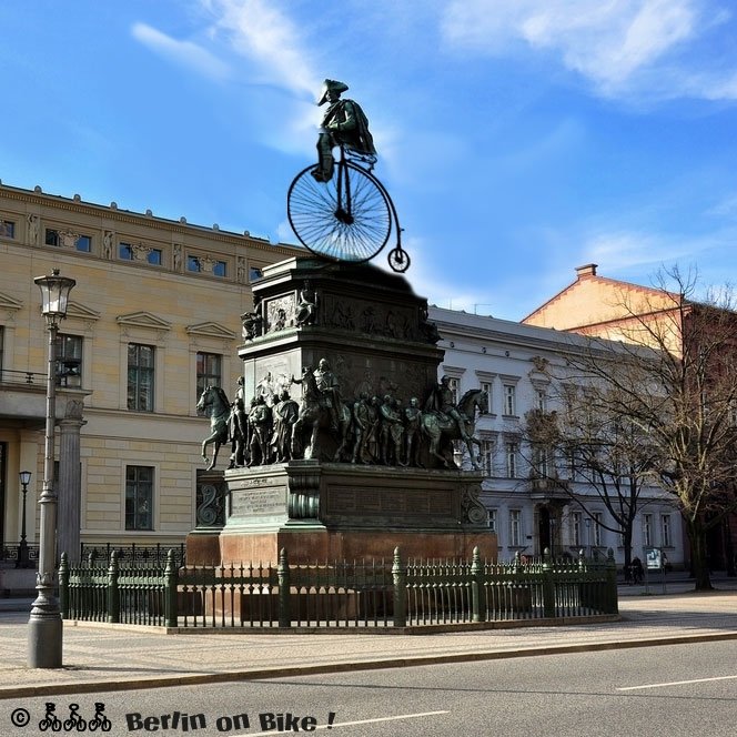 a statue in front of a building