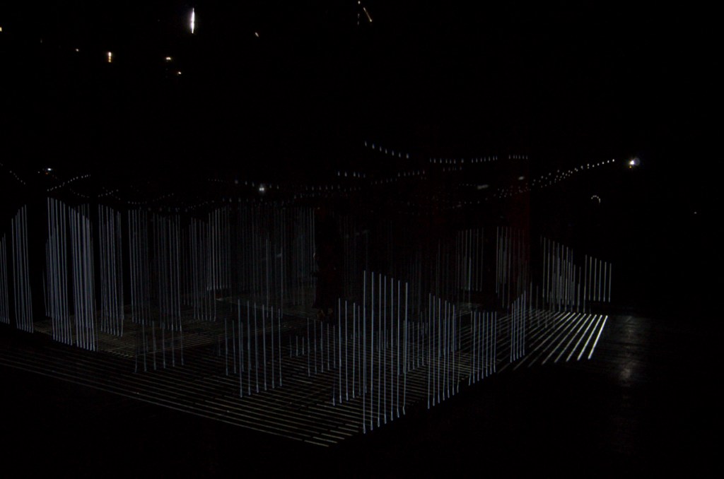 a lit up bridge at night