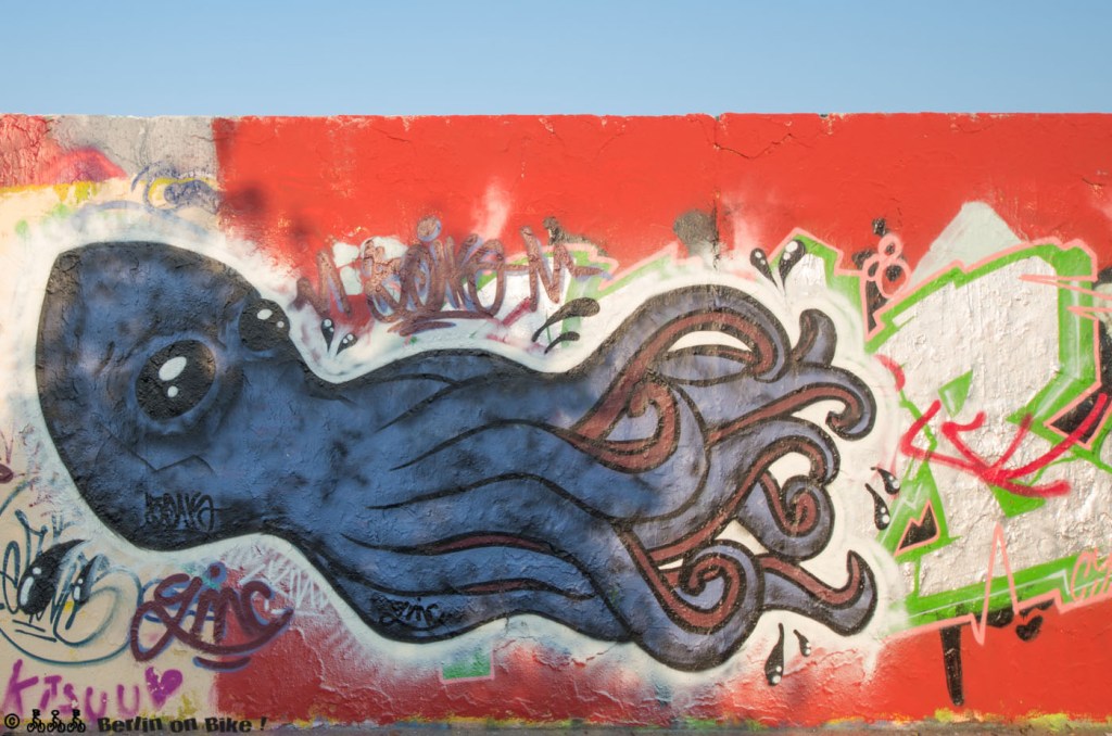 Giant octopus who looks a little like his head was caved in, love the colours though.