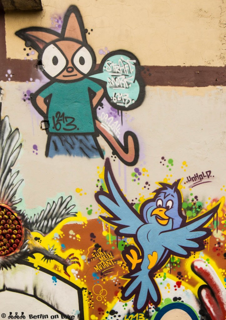 a graffiti covered wall