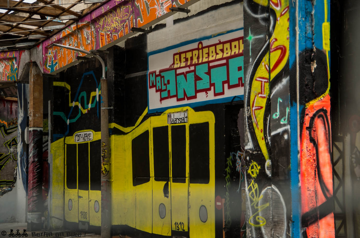 a train covered in graffiti