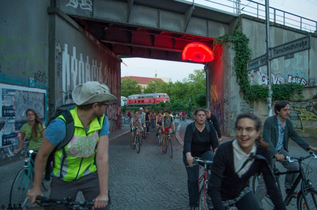 artspin-4379-1024×678 a group of people walking down a street