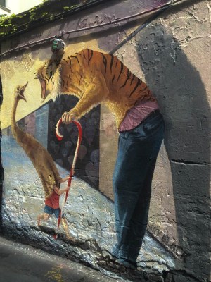 a person walking down a sidewalk