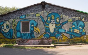 colorful graffiti on the side of a road