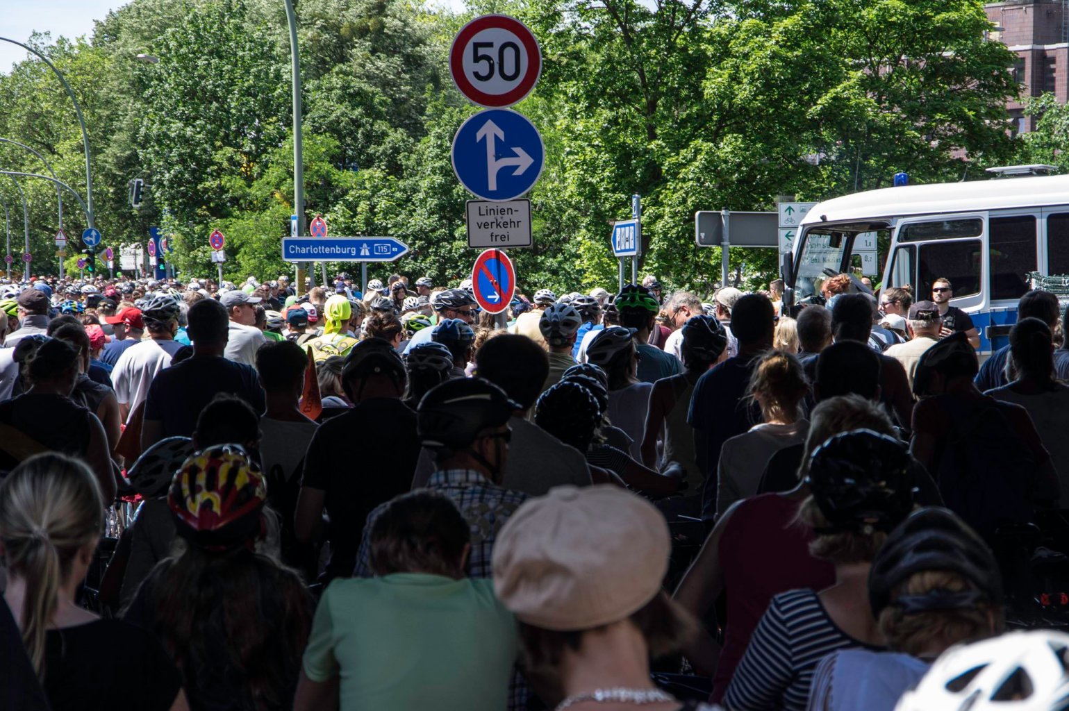 a group of people standing in front of a crowd