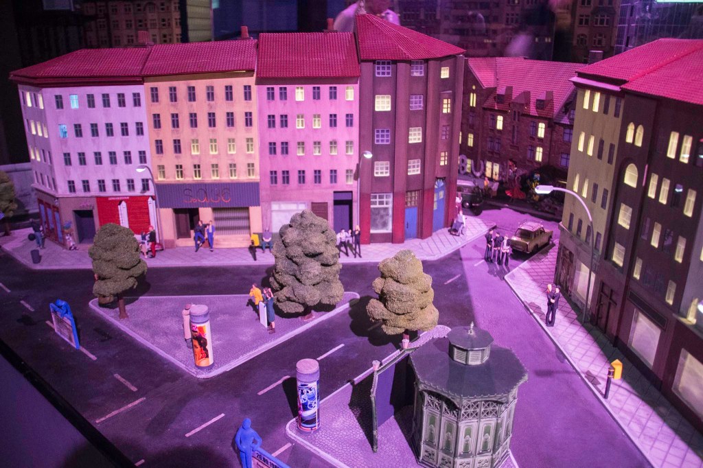 a group of stuffed animals sitting on top of a building