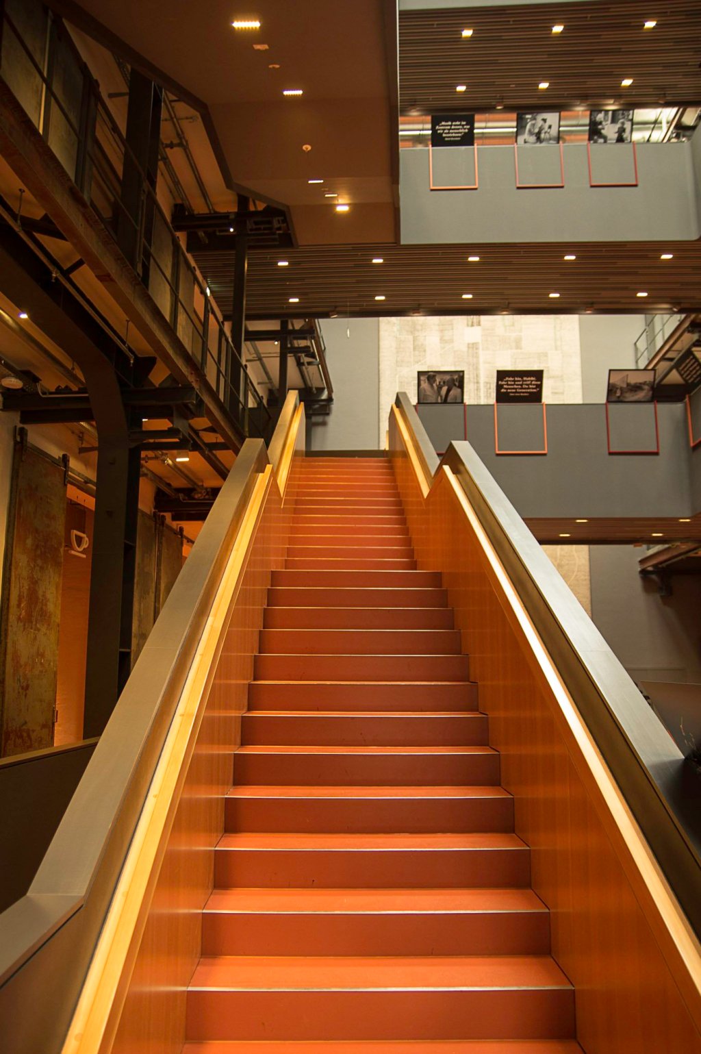 a large long train on a subway platform