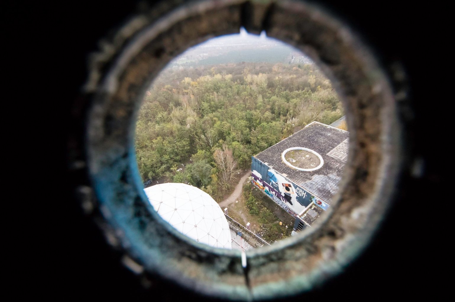 a close up of a round mirror