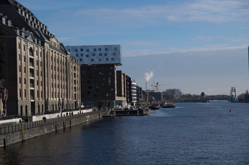 a river with a city in the background