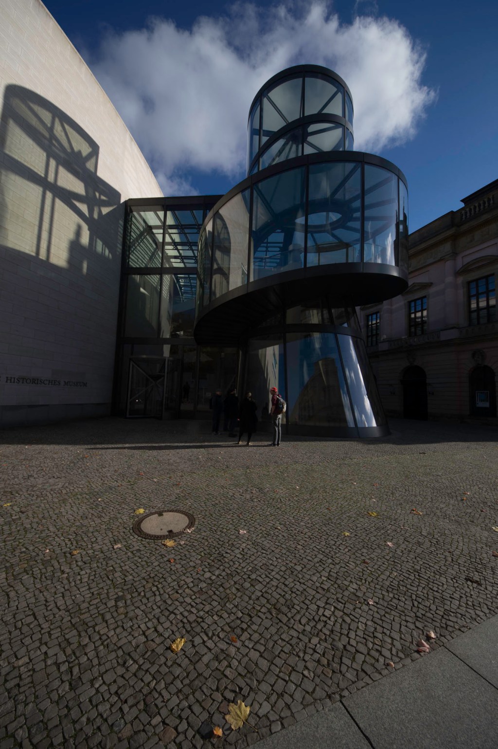 a man standing in front of a building