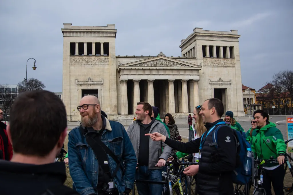 Bike tour in front of the propyläen at Königplatz in central Munich
