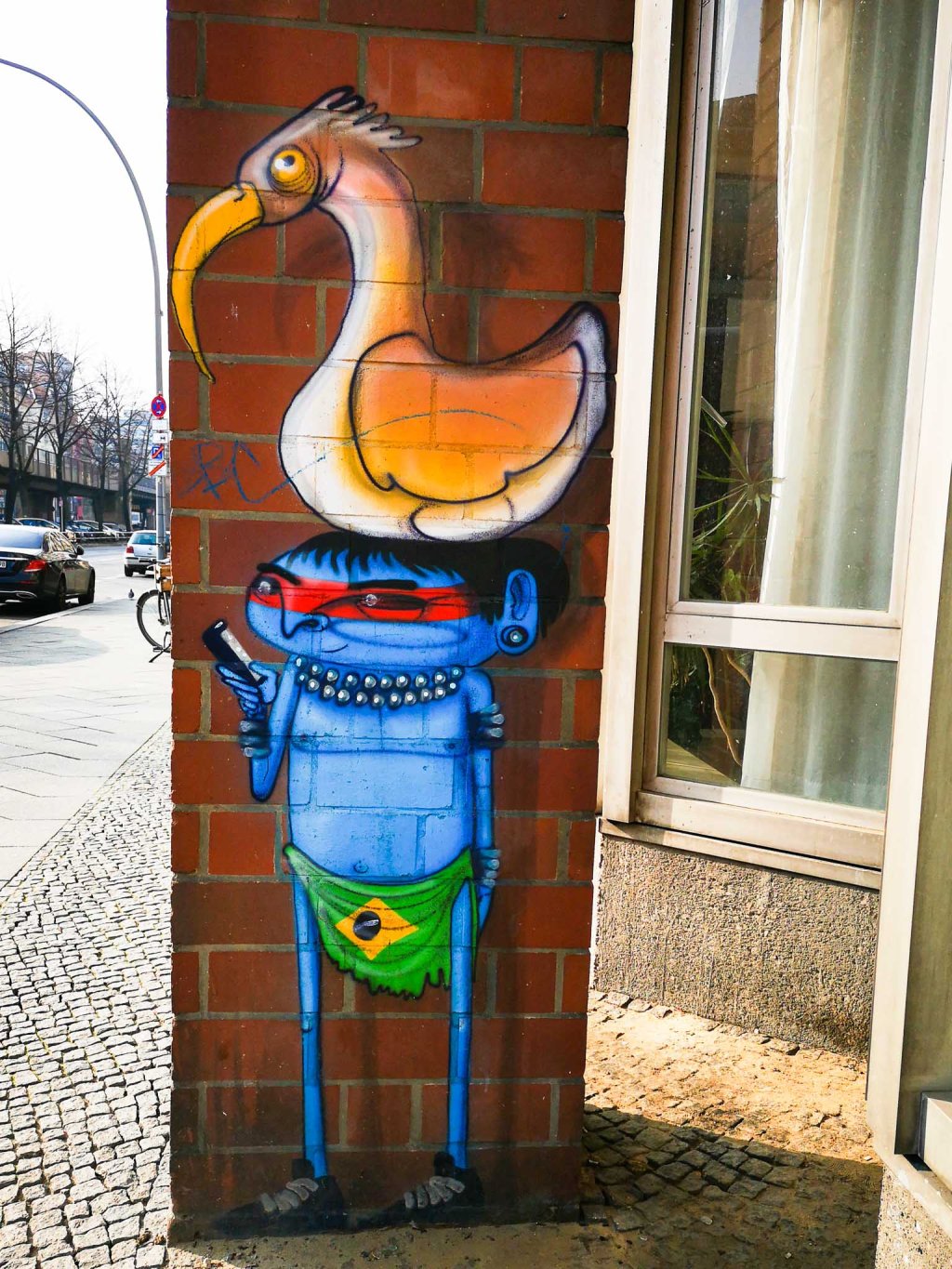 this guy looks very happy, but what's not to like anyway if you have a bird on your head?