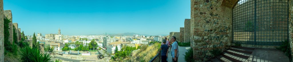 Stitched Panorama foto of the old-town of Malaga from appr. 50m elevation. Right and left the walls of Alcazaba, just below the Roman amphitheatre and the skyline including the Malaga cathedral.
