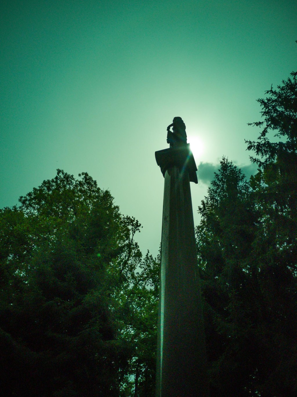 a person standing in front of a tower