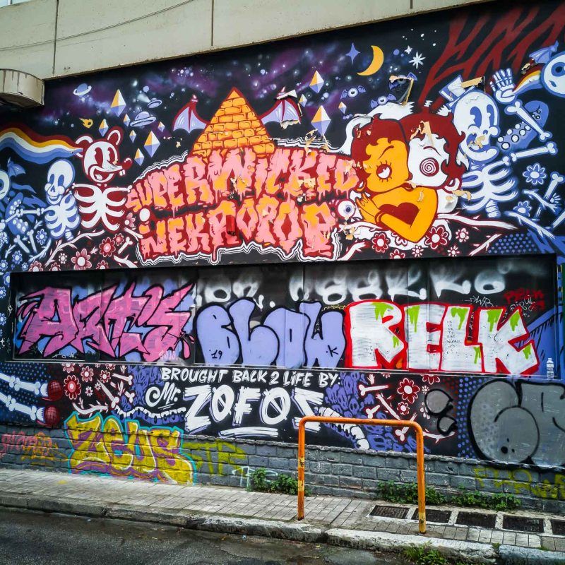 a graffiti covered wall
