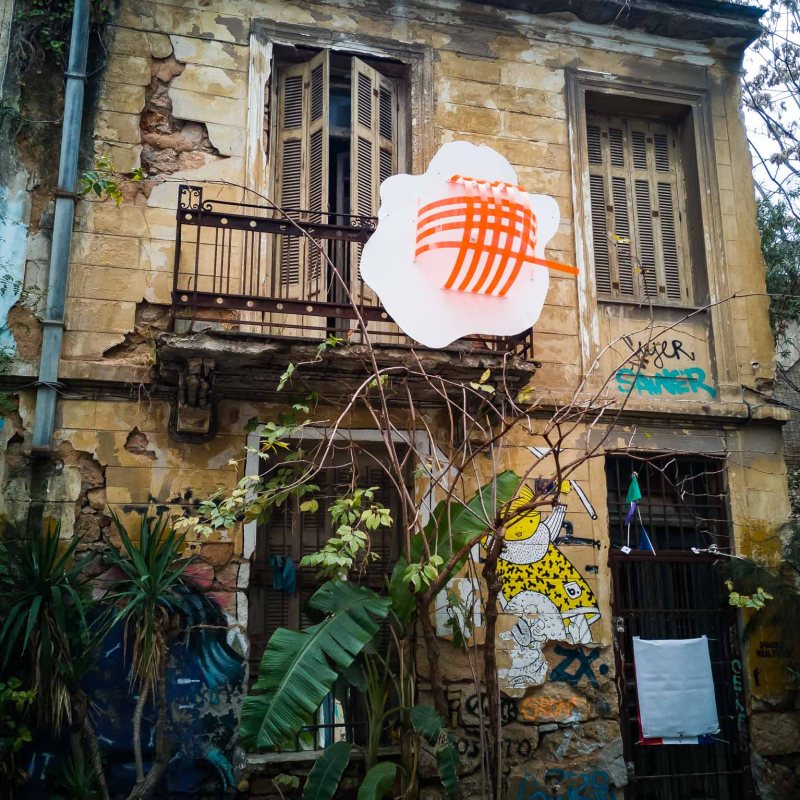 a group of people standing in front of a building