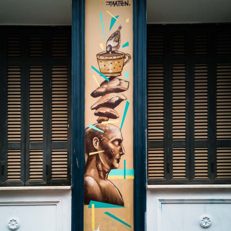 a person sitting in front of a window