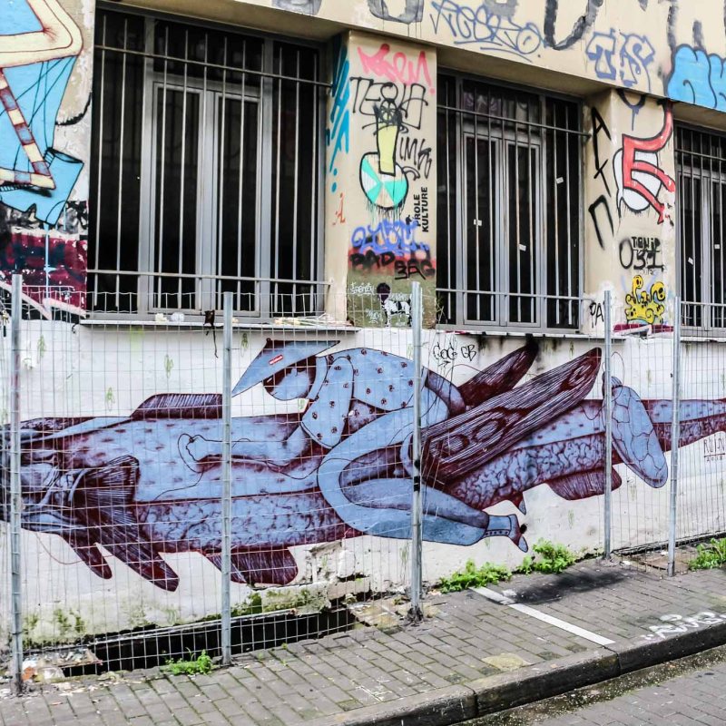 colorful graffiti on the side of a building