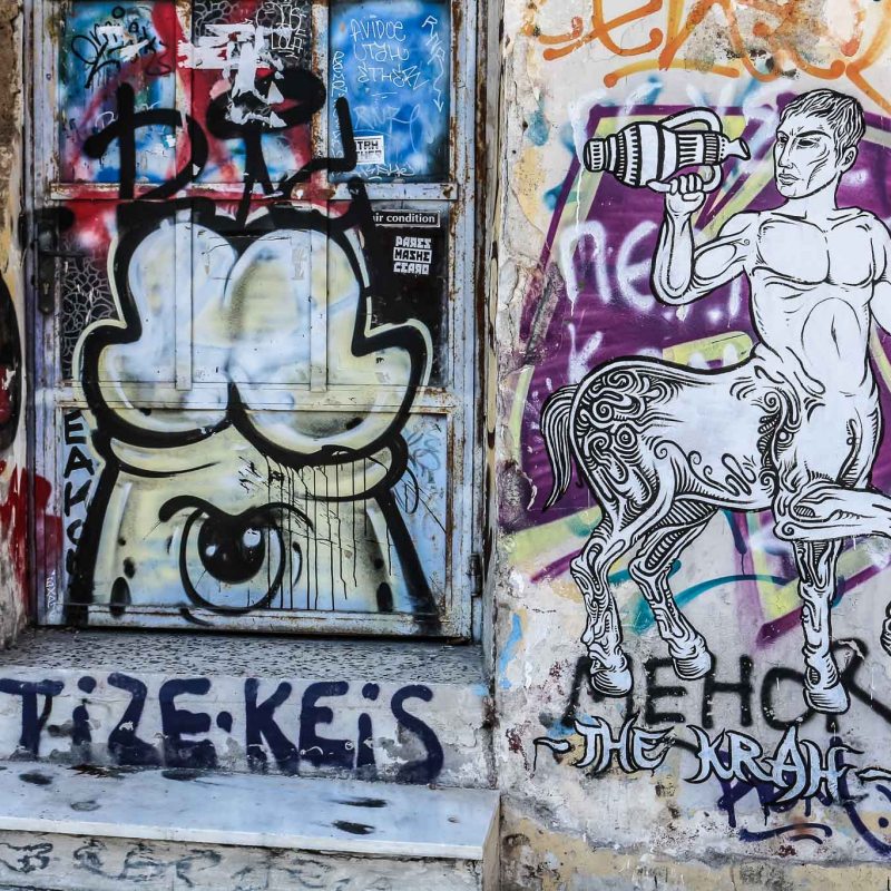 a graffiti covered wall