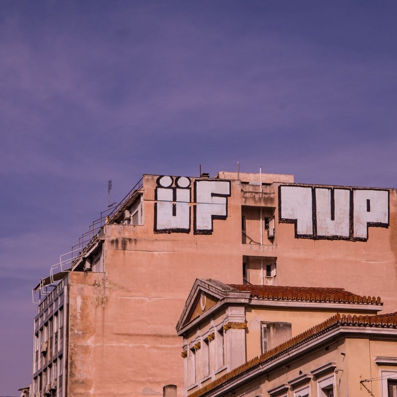a large clock tower towering over a city
