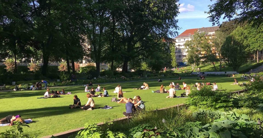 Locals chilling in the sub-street level Körnerpark in Neukölln