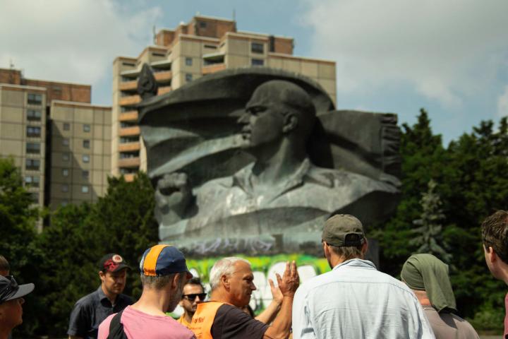 a group of people standing in front of a crowd