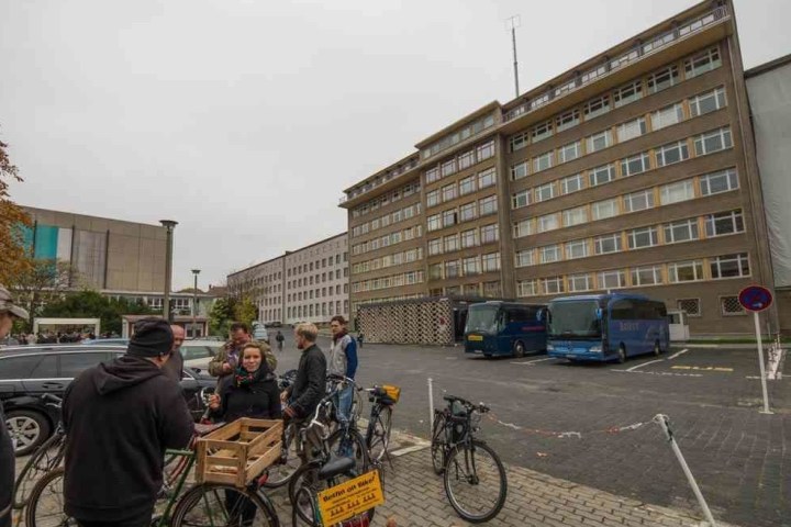 a man riding a bicycle on a city street