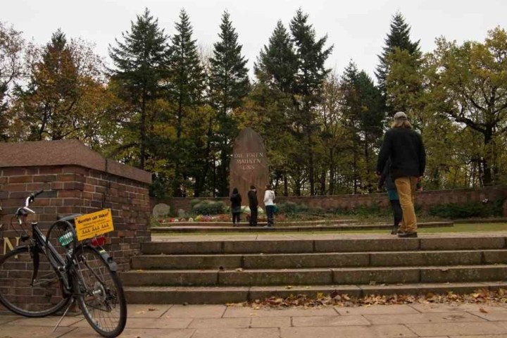a person riding on the back of a bicycle