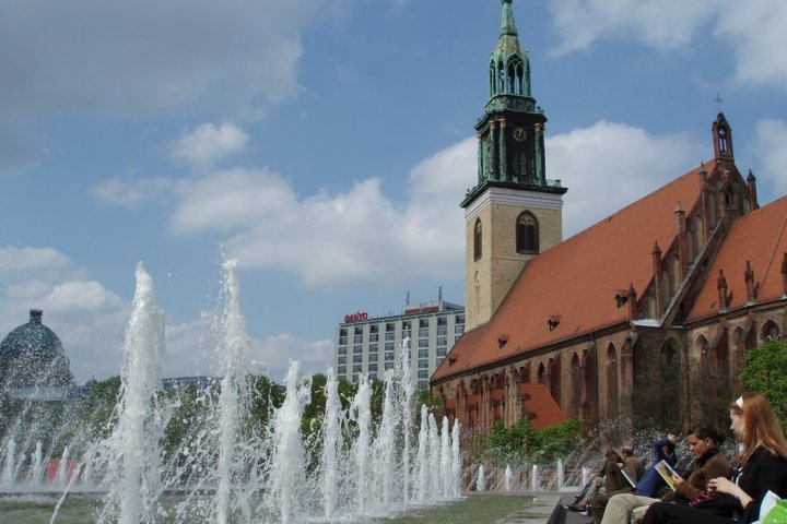 a group of people standing in front of a building