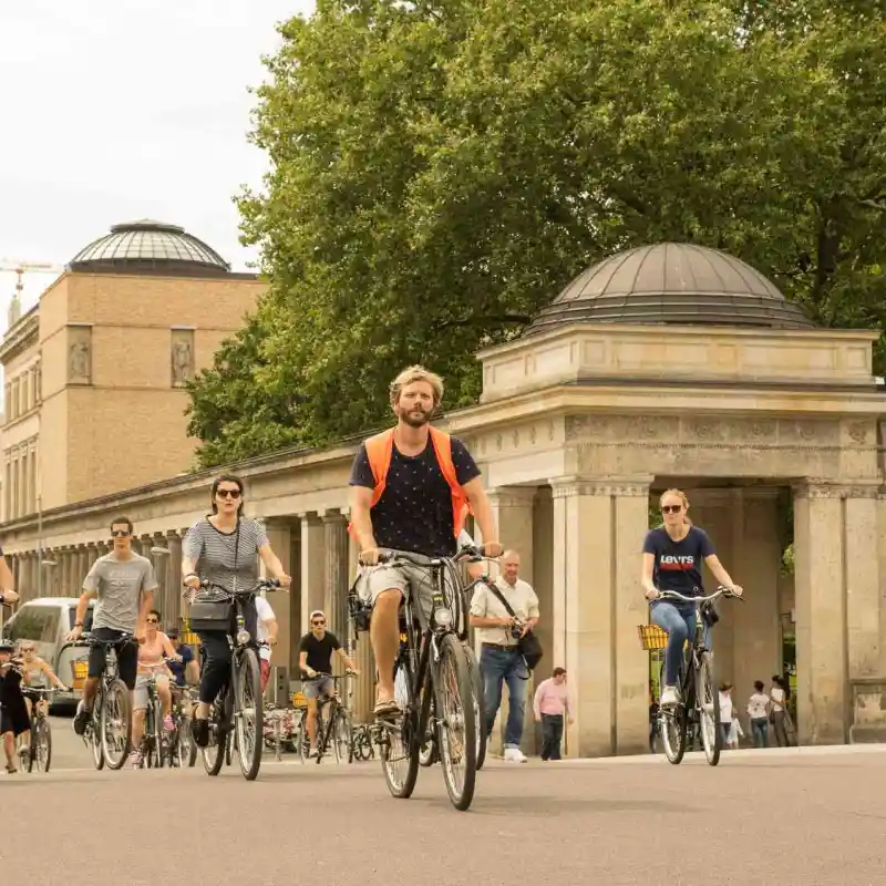 a group of people walking down the street