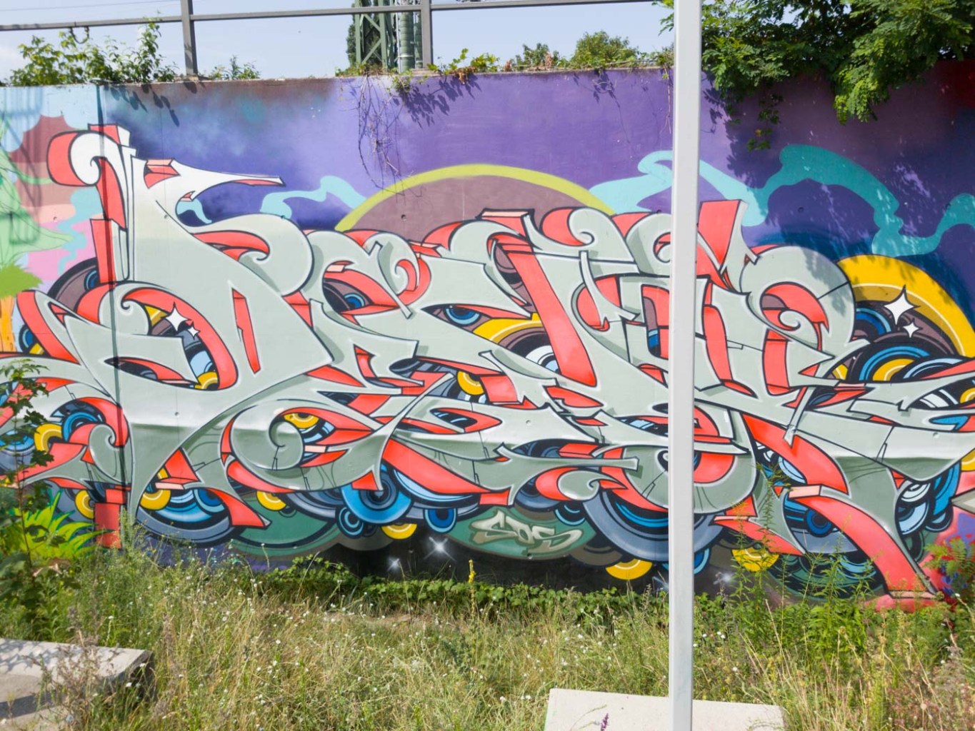 a graffiti covered wall