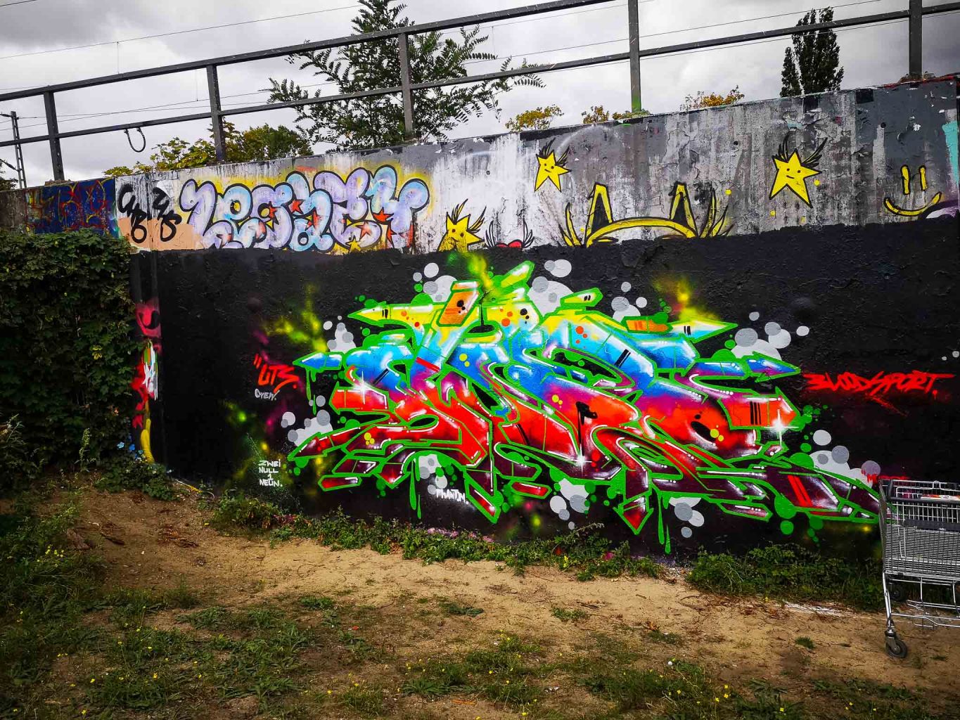 a row of colorful graffiti