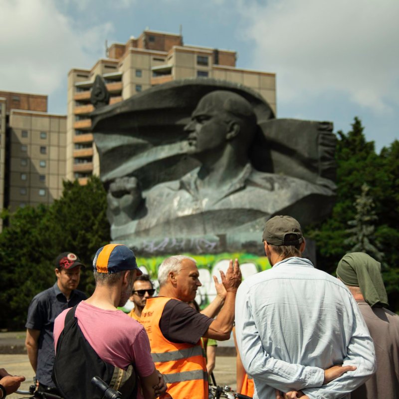 a group of people standing in front of a crowd