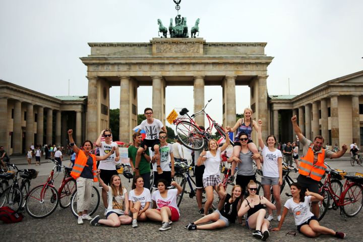 a group of people standing in front of a building