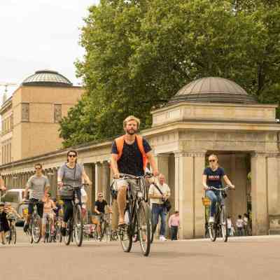 a group of people walking down the street
