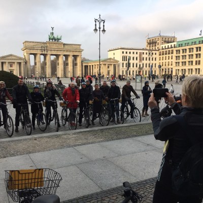a group of people standing in front of a building