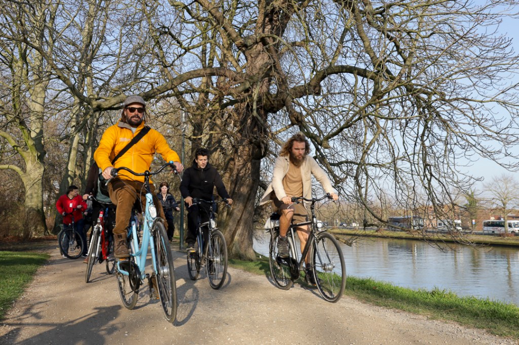 Cycling along the canal in Bruges