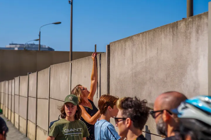 a group of people standing in front of a building