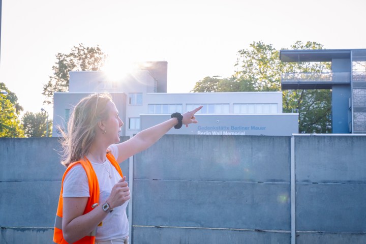 a person standing in front of a building