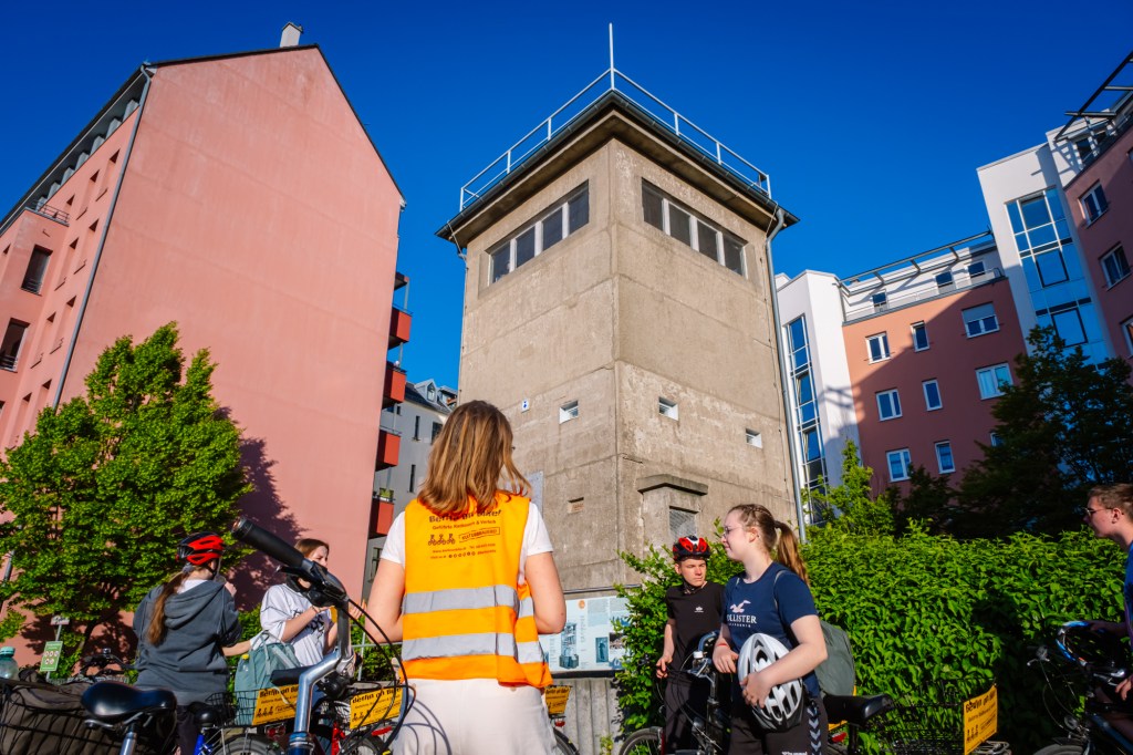 a group of people standing in front of a building